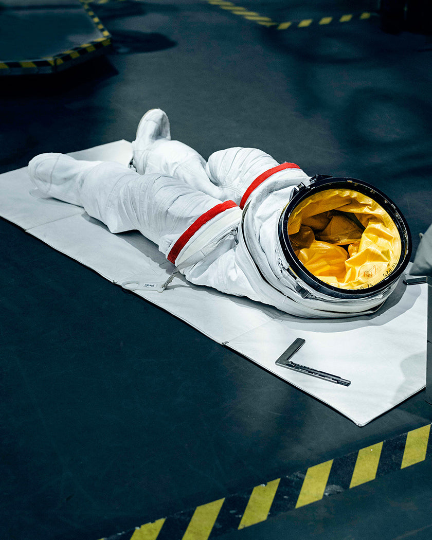 Lower part of a space suit placed on the floor. Photo: Mattia Balsamini