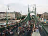 People sitting and strolling over Liberty Bridge in Budapest, Hungary (photo: Monocle 2018)