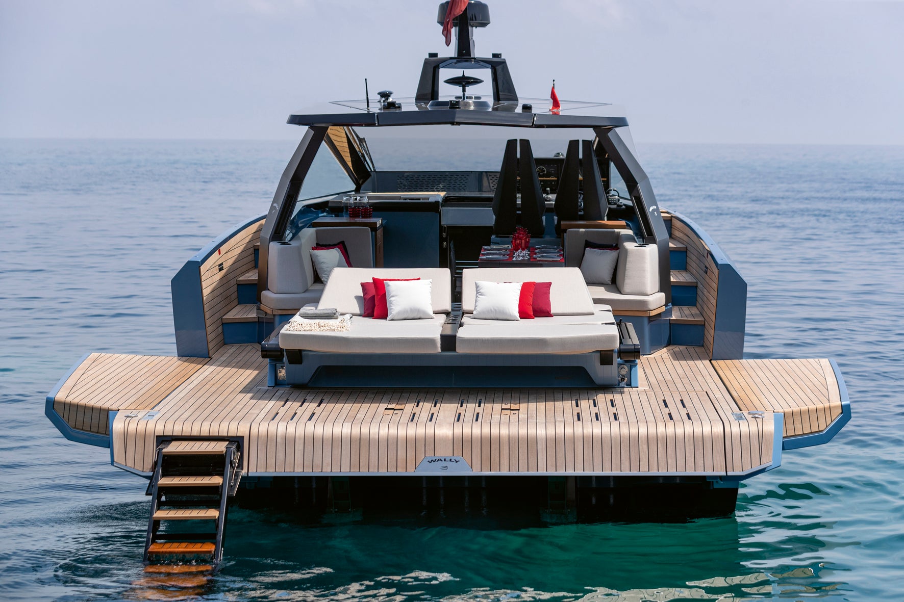 Luxury yacht with a sunken deck area on calm water