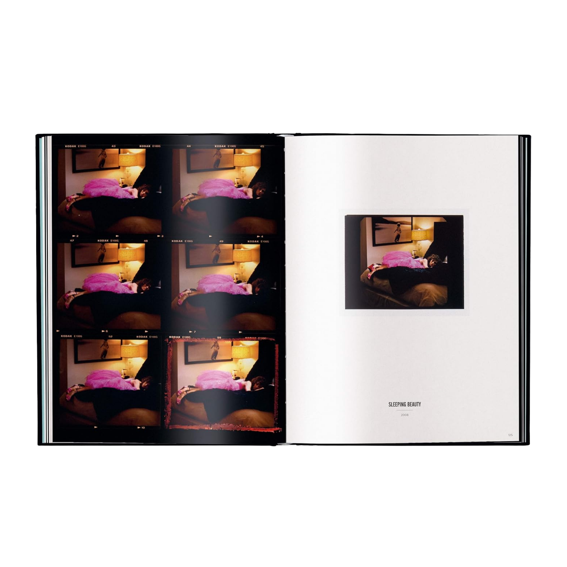 Open book showing a series of images of a person lying in bed with pink pillows.