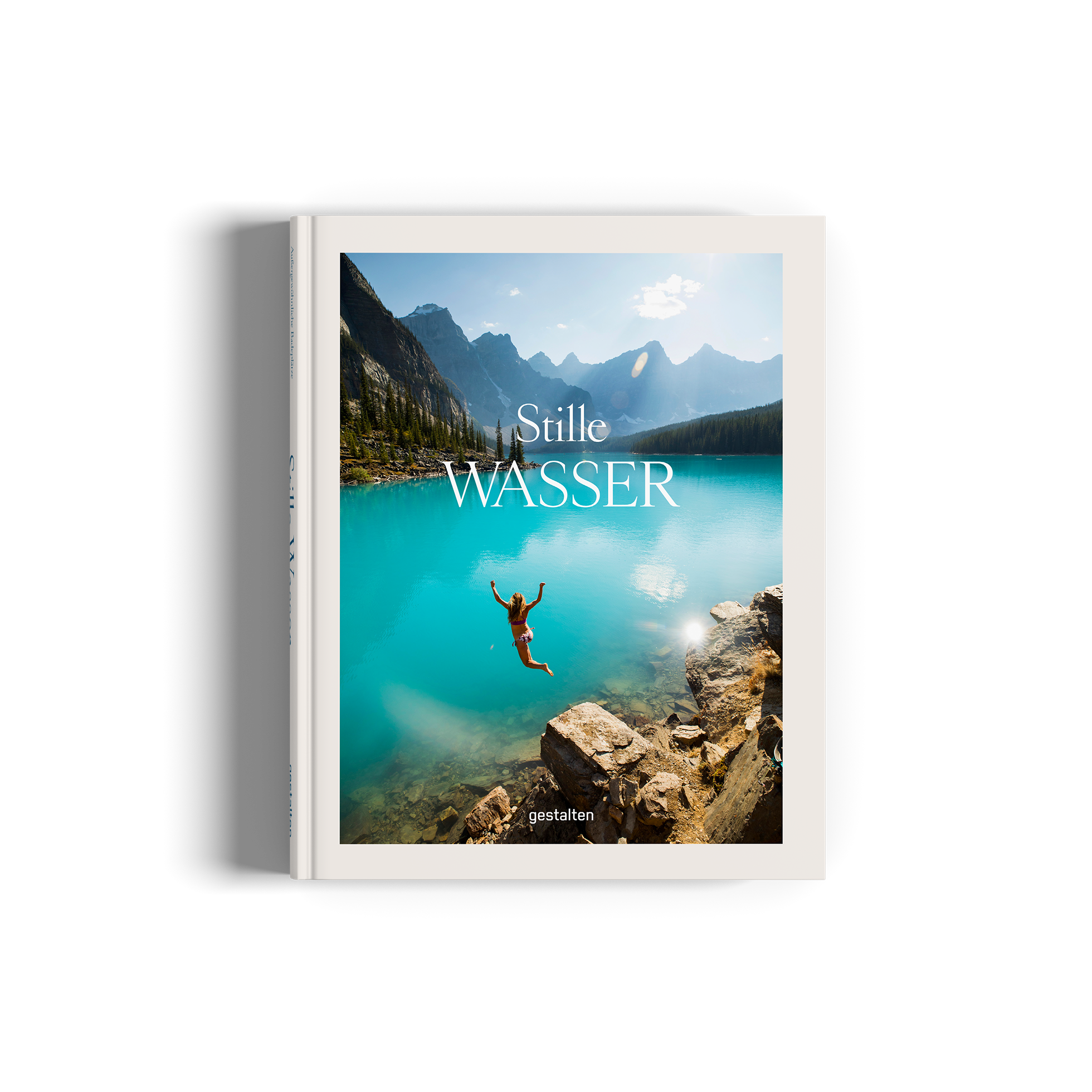Book cover of 'Stille Wasser' with a person diving into a mountain lake.