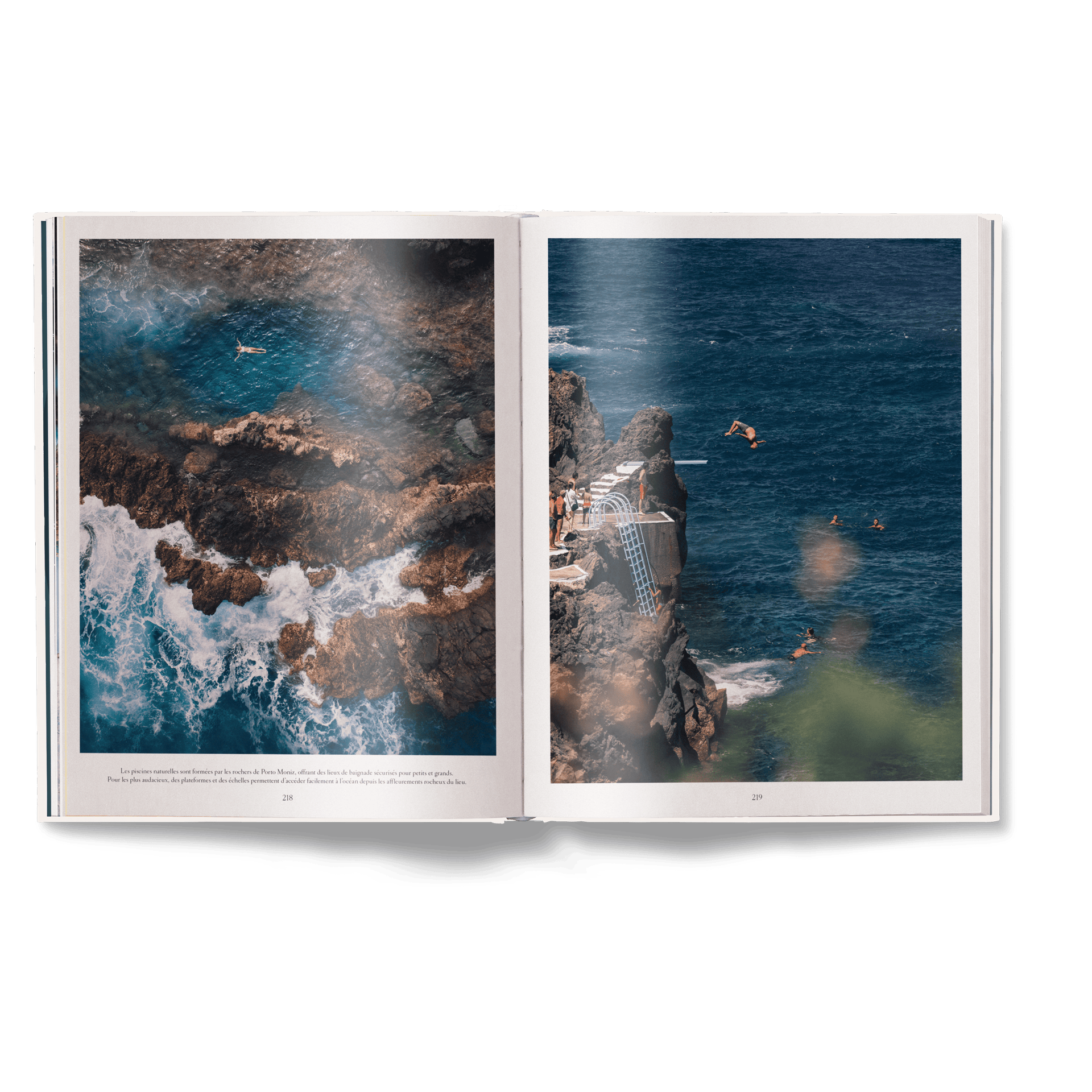 Open book showing two scenic images of a coastal landscape with waves and cliffs.