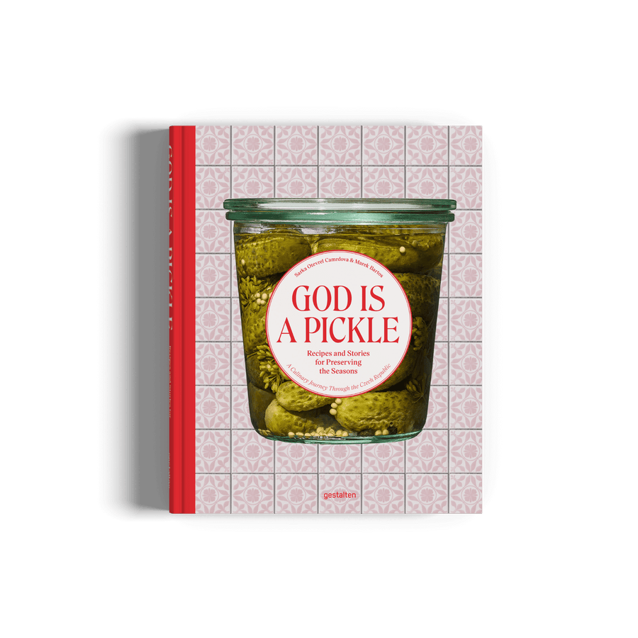 Book titled 'God is a Pickle' with a jar of pickles on the cover, featuring a red and white label.