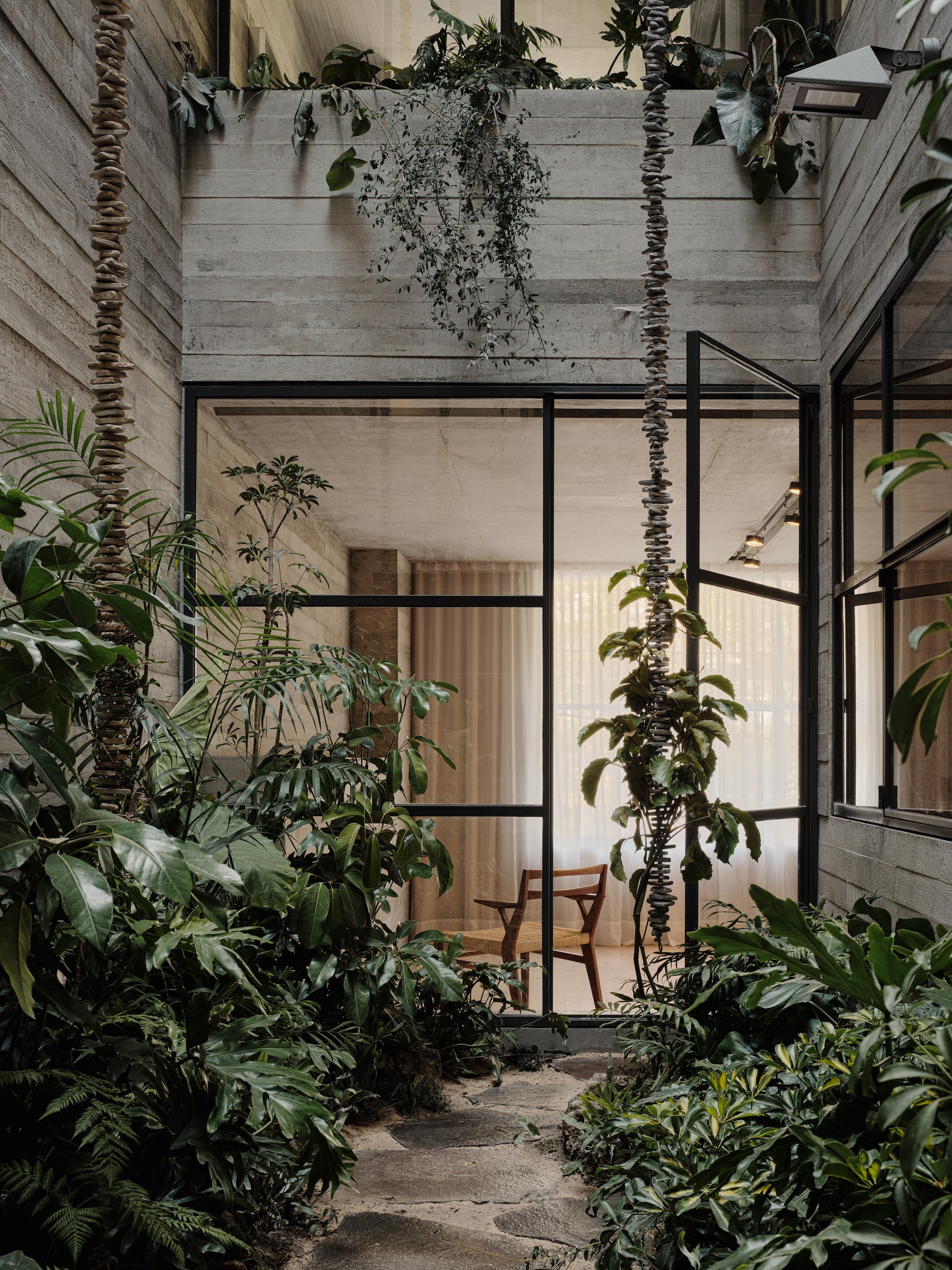 Rick Joy is known for creating beautiful buildings in wide-open expanses of desert landscape. With this project in Mexico City, he faced the opposite setting—a tight urban plot, surrounded by buildings on three sides. Despite these constraints, Tennyson 205 is a sanctuary that still captures Joy’s characteristic openness and appreciation of nature.