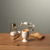 A bullet and a boiled egg. Image by Fragmento Universo
