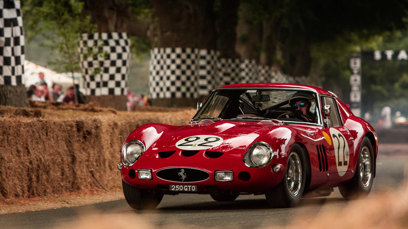 Red Ferrari 250 GTO on a race track at Goodwood Festival of Speed (Photo: Alex Lawrence – The White Wall 2018)