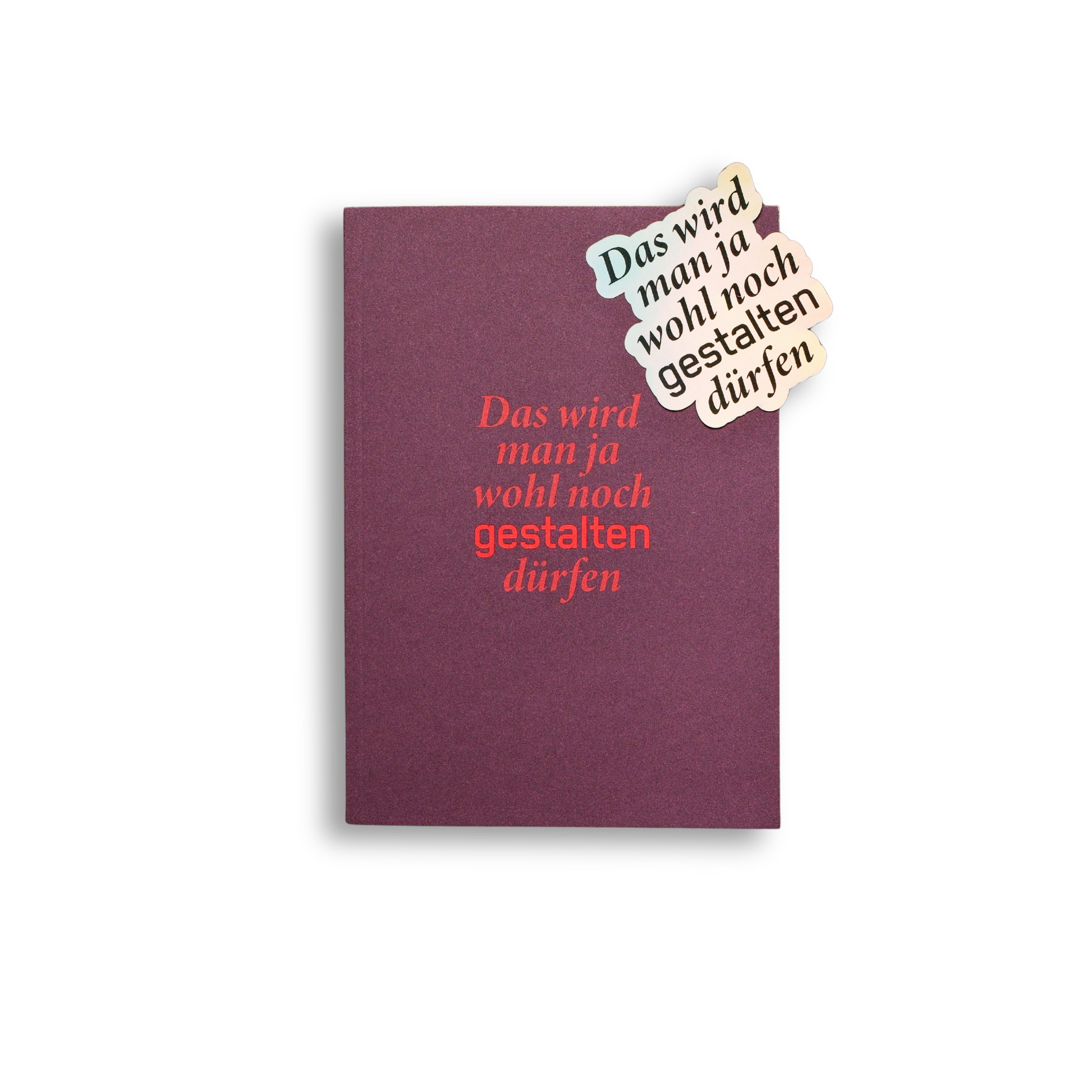 Purple book with red text and decorative stickers on a white background