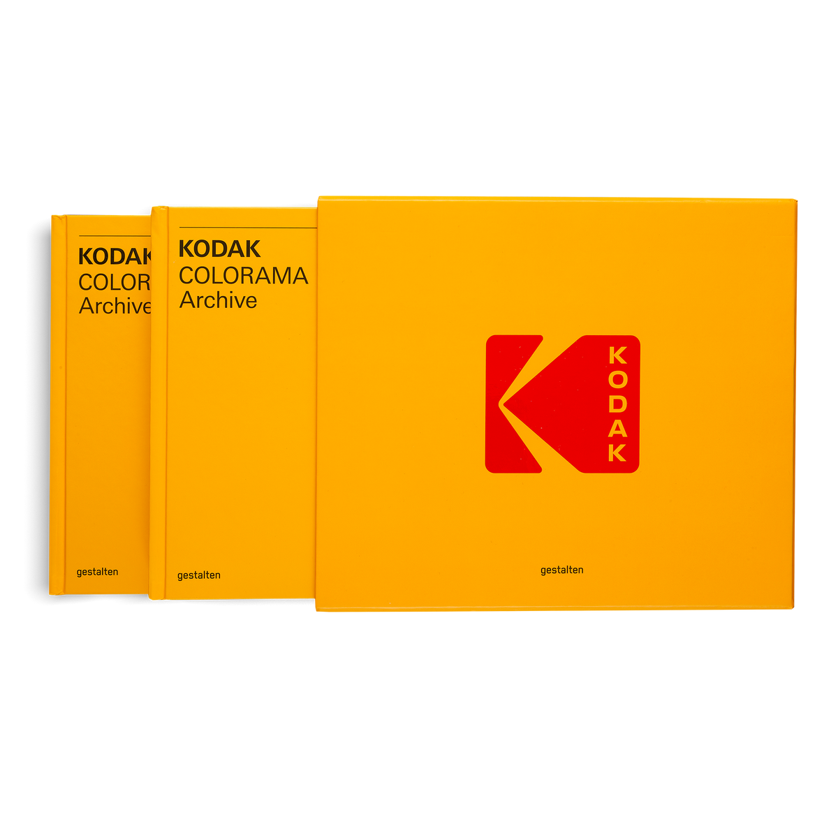 Three Kodak Colorama Archive photo albums in bright yellow with the red Kodak logo, arranged in a fan-like stack on a white background.