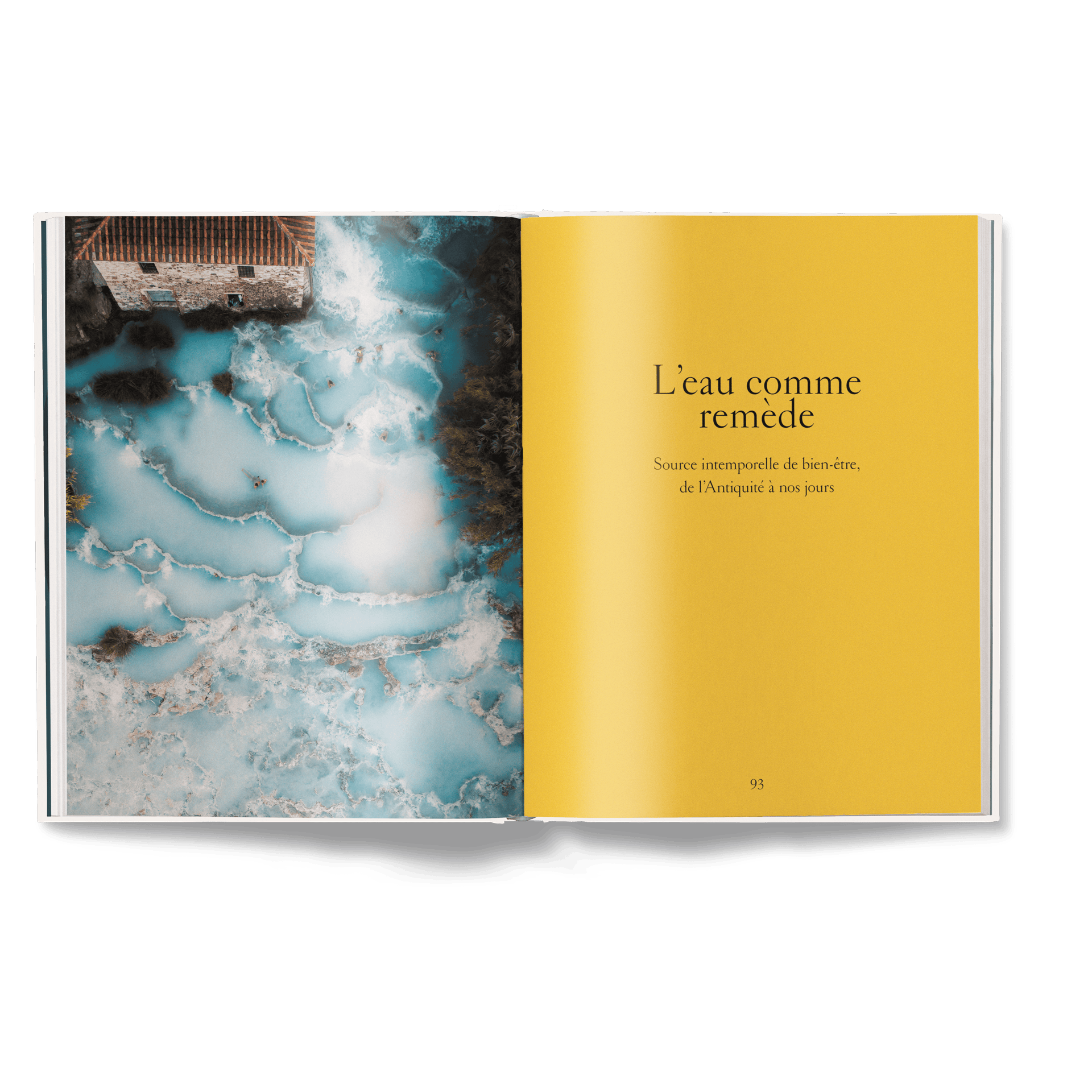 Open book with a scenic image of water and text on a yellow background