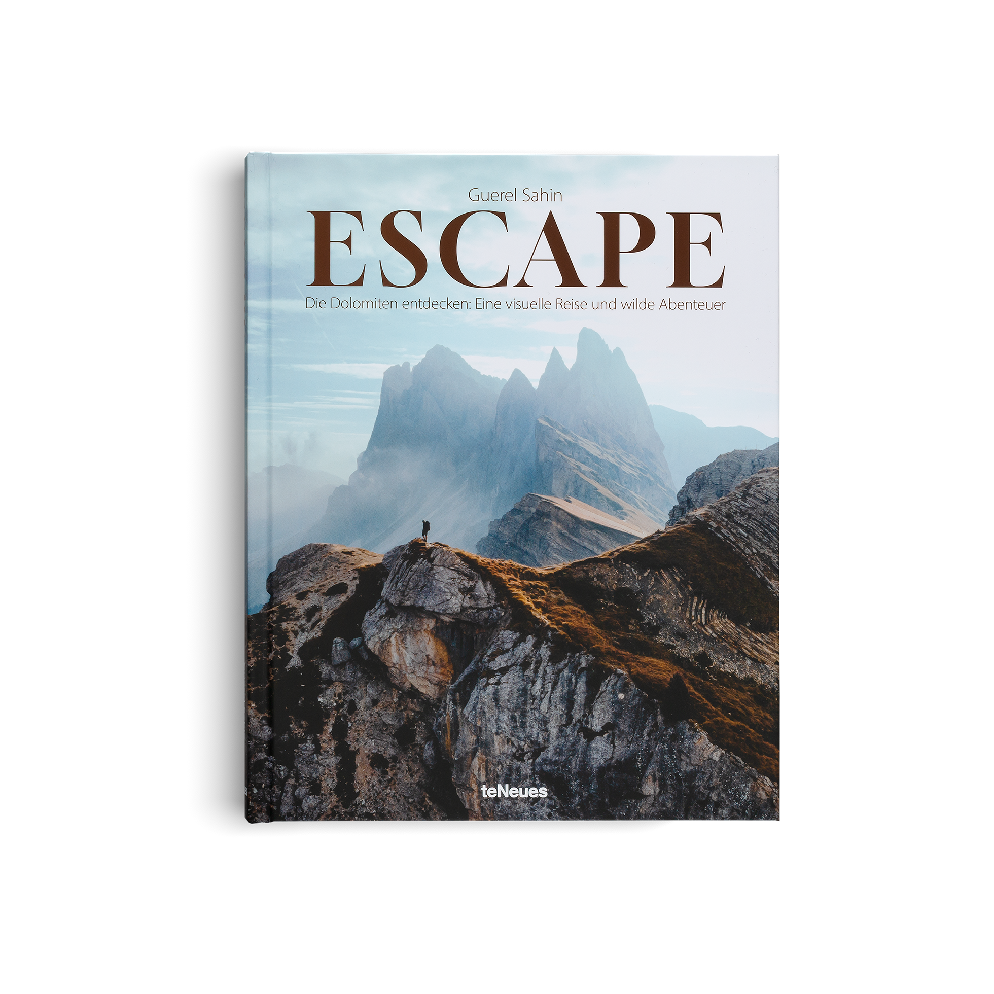 Book titled 'Escape' with a mountain scene on the cover