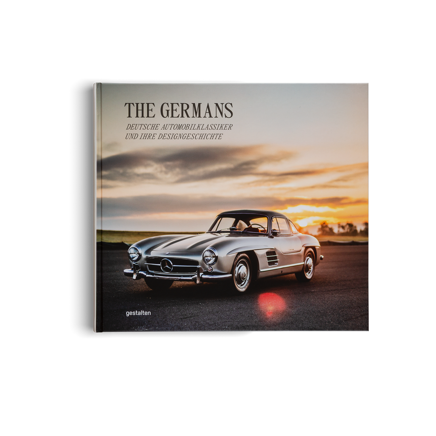 Book titled 'The Germans' featuring a classic Mercedes-Benz car on the cover.