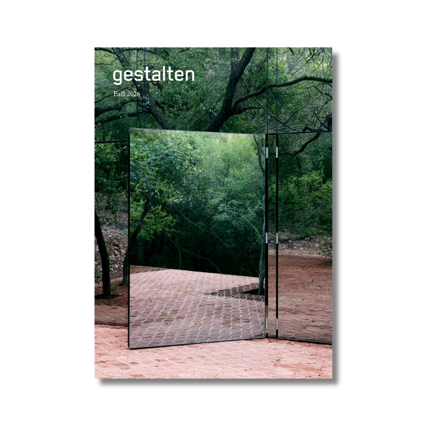 Cover of 'gestalten' magazine featuring a reflective surface with greenery.