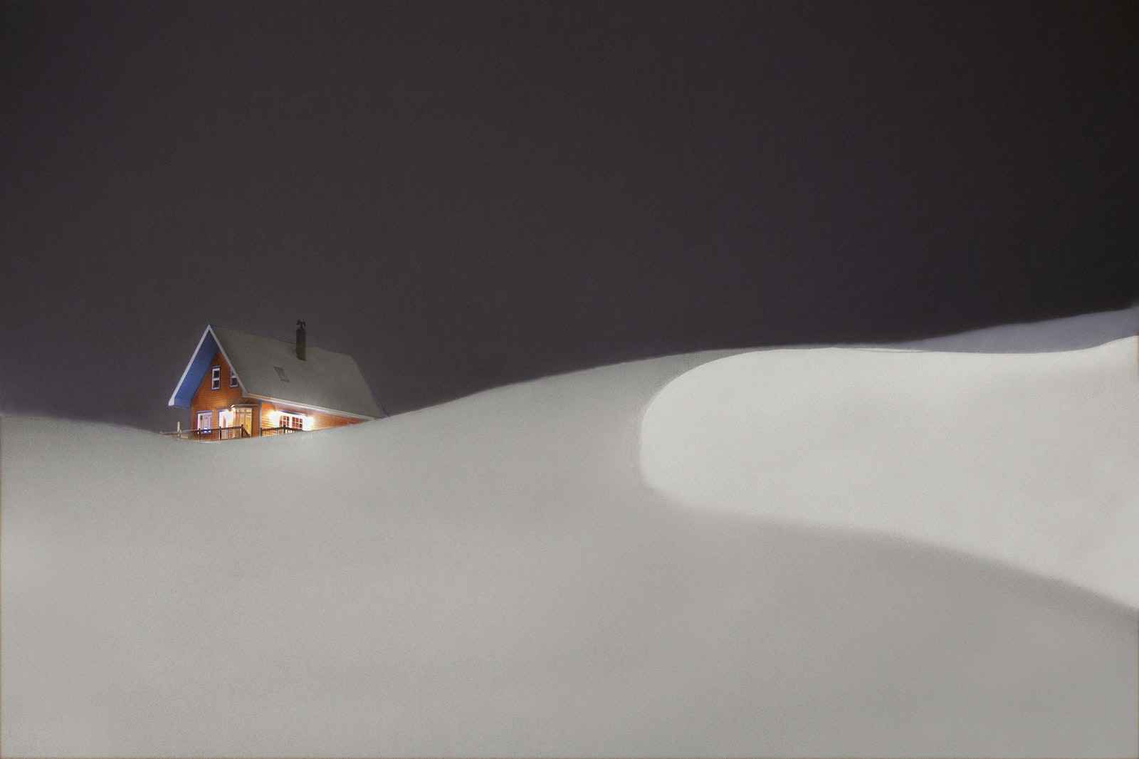 Small house with a red roof on a snowy landscape at night.