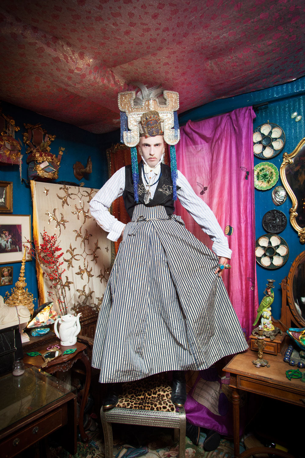 extravagant dandy on a chair