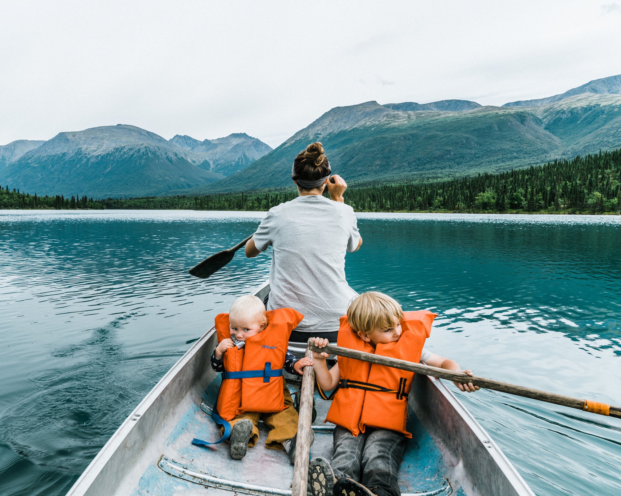 A family on a boat in Family Adventures