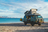 Volkswagen T3 Vanagon Syncro, un van sur la plage dans Prendre la route