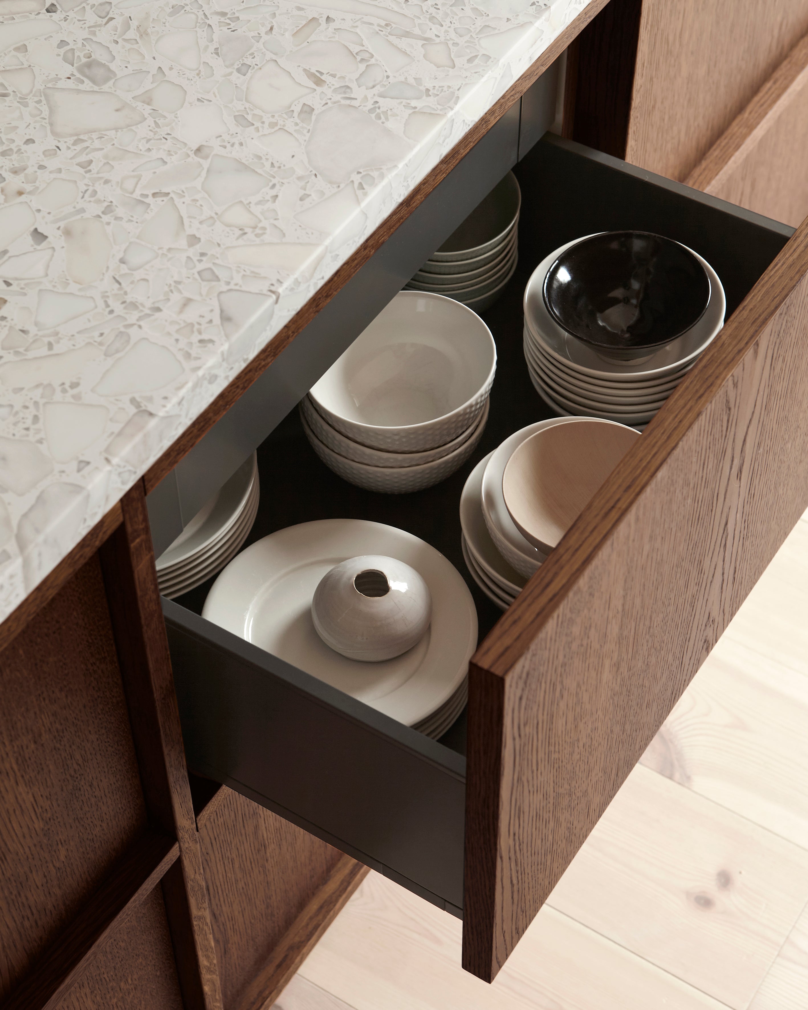 Plates in a kitchen cabinet