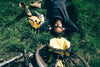 Martijn Doolaard lying in the grass with his bike.