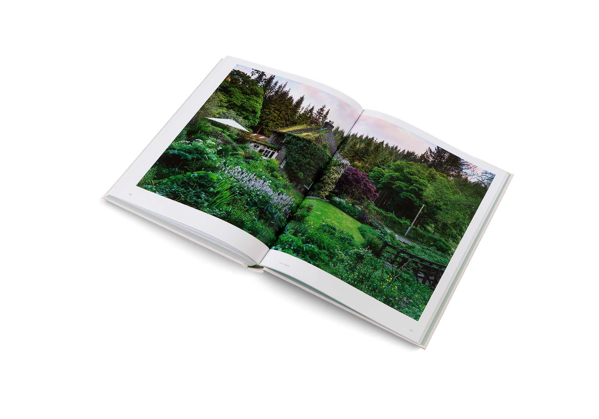 High in the Black Mountains of the Brecon Beacons National Park in Wales lies Nant-y-Bedd: a garden amongst the trees of a thick conifer woodland. The surrounding nature inspires—and is welcomed into—the garden. Find more about this amazing garden in The Avant Gardens by John Tebbs.