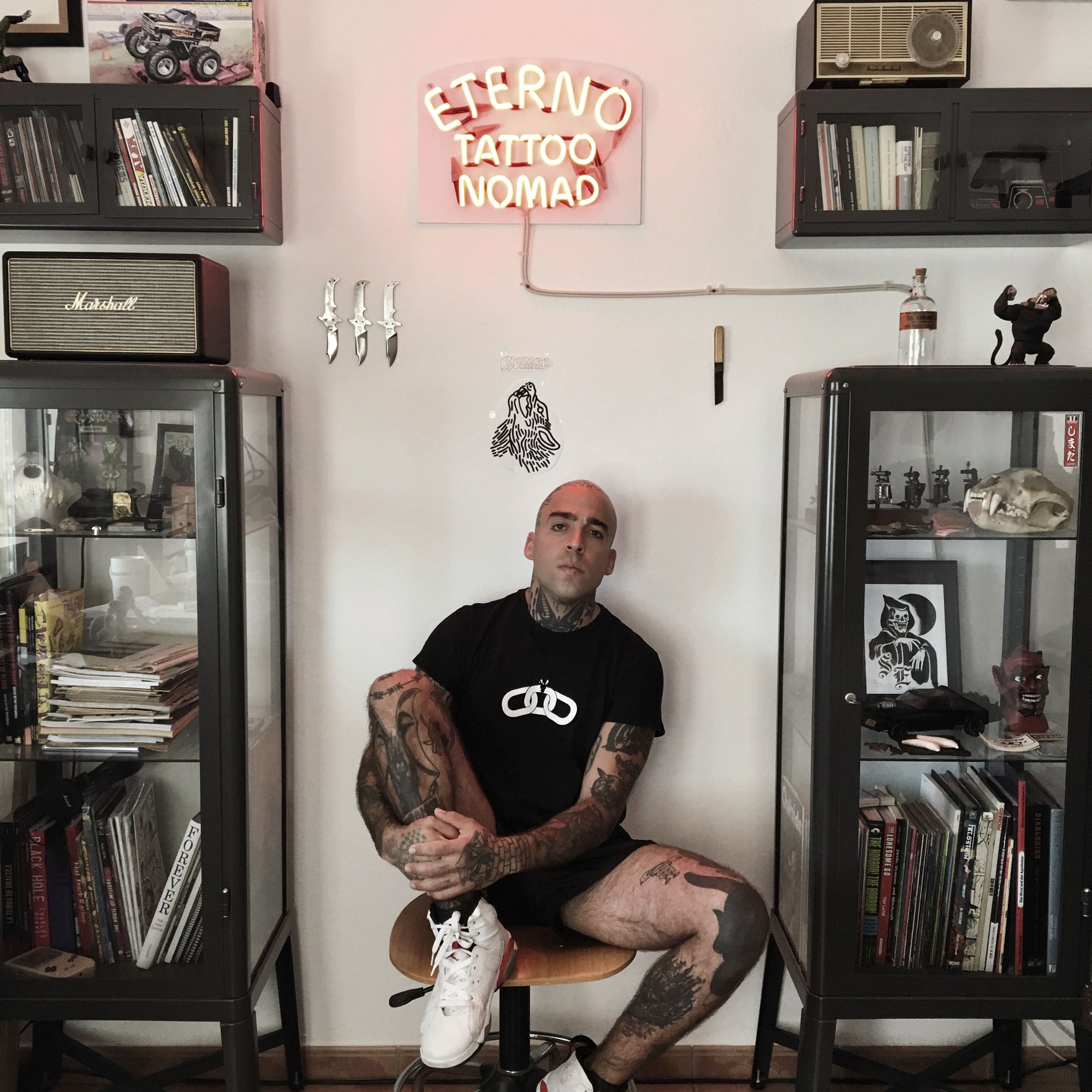 A tattooed man in Forever More Book