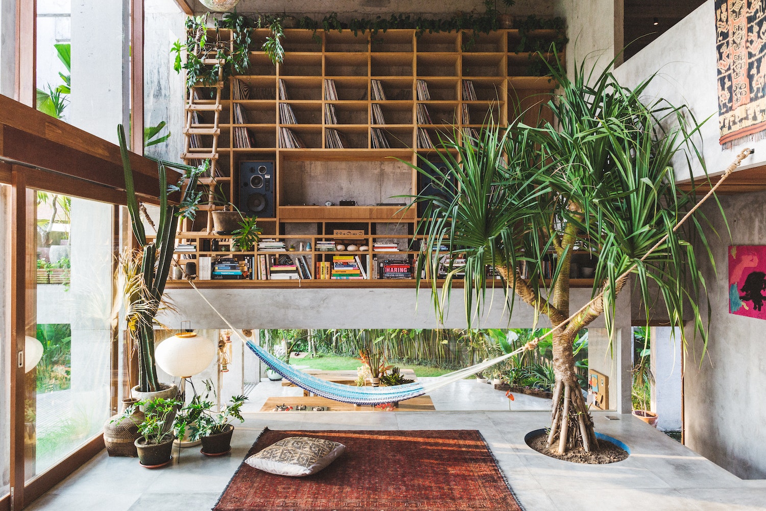 Wide open windows allow the inhabitants of Padang Linjong Residence to always indulge in the location’s tropical living vibe, and huge, airy spaces allow air and light to circulate throughout the day. Discover more about this project in Concrete Jungle. 