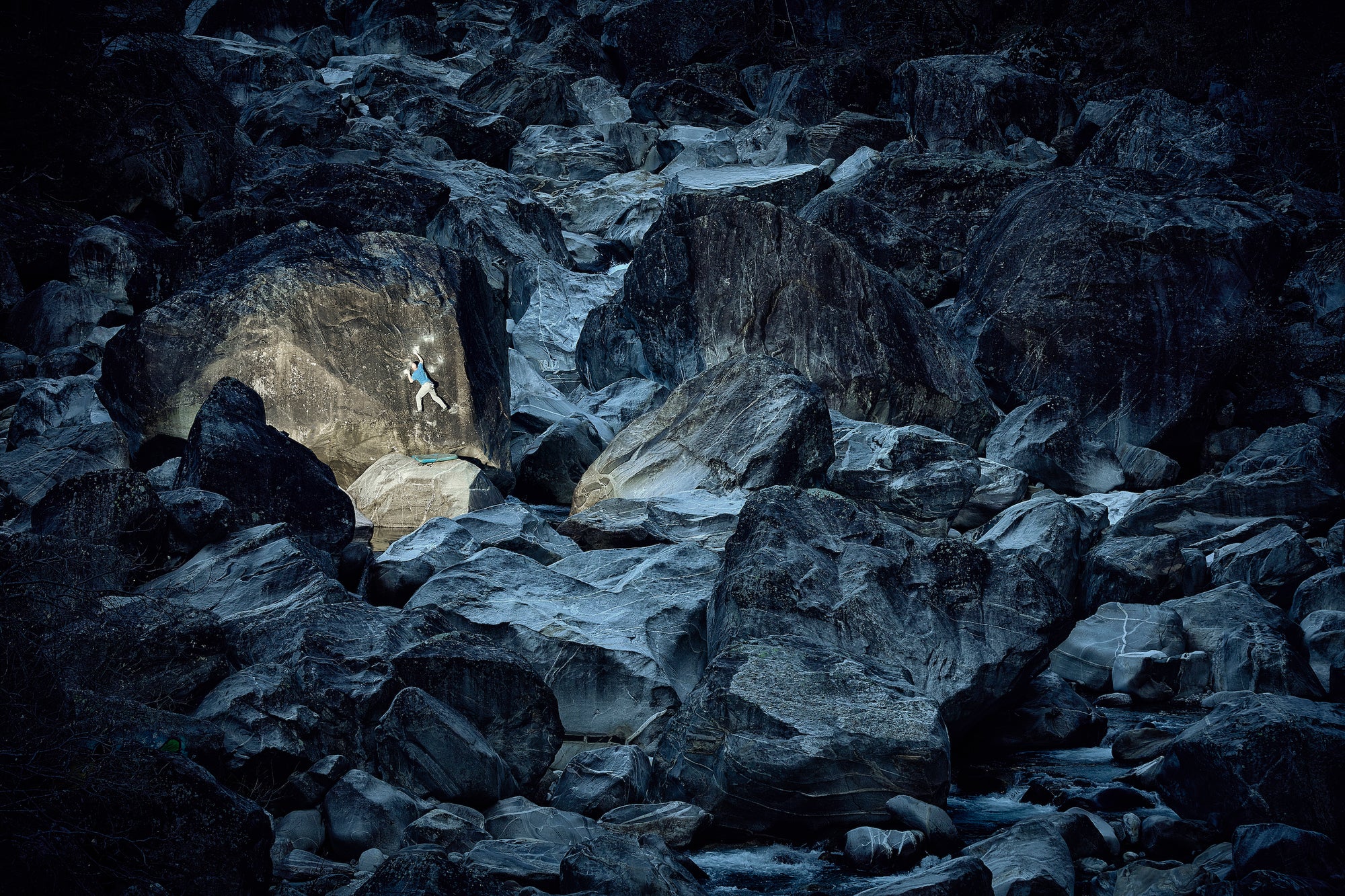The Chris Schulte boulder in the wild river - bed of the Verzasca in Switzerland. Discover more in Bouldering by gestalten