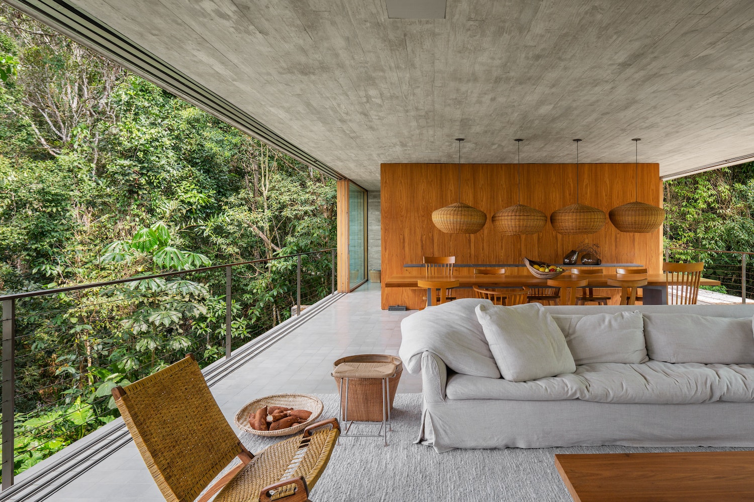 Azul House by Studio MK27 seems to float above its surrounding landscape in an environmentally protected area. This beautiful project is featured in Concrete Jungle by gestalten.