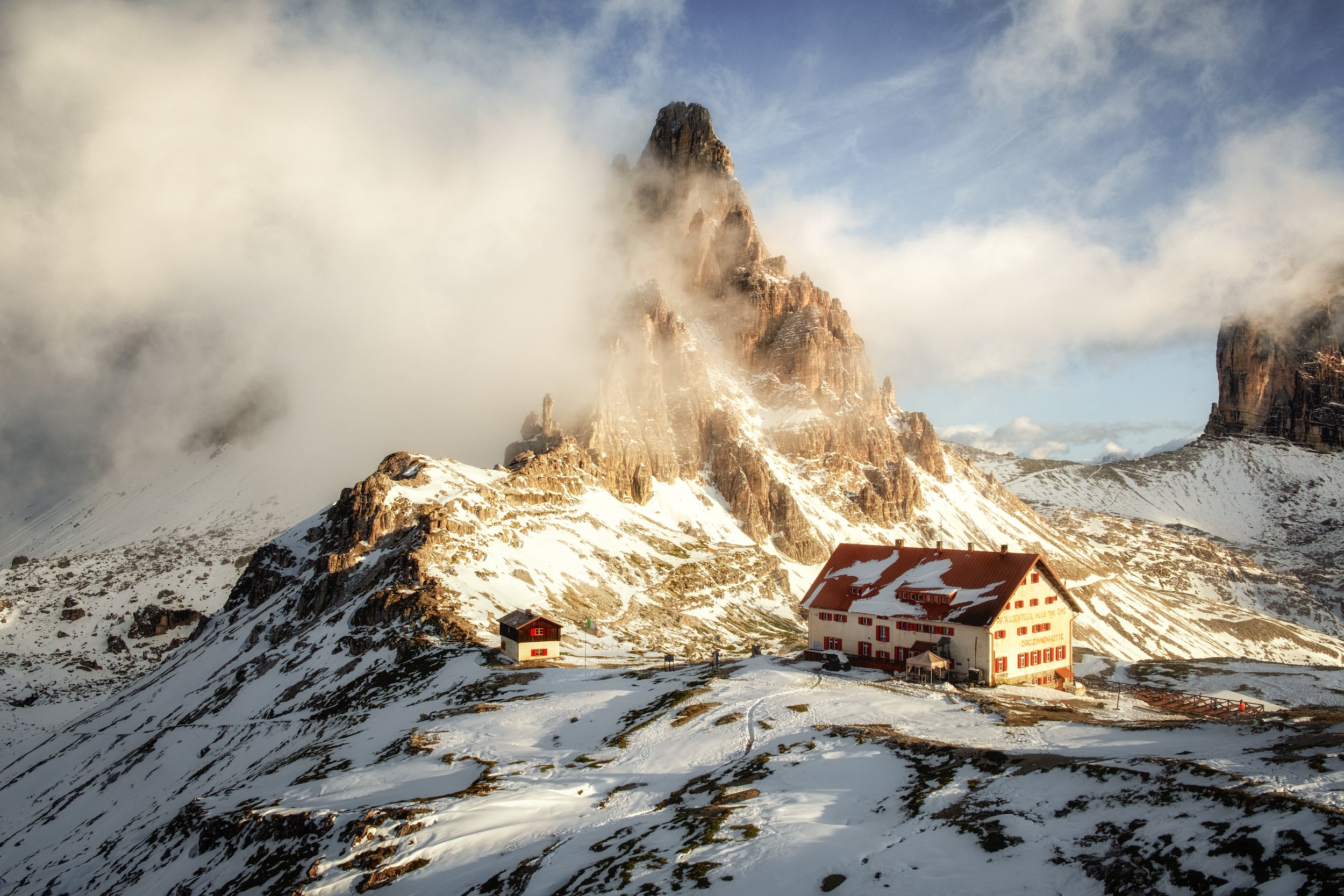 The Alta Via 4 will take you through the most majestic regions in the Dolomites: the Sesto Group (including the famous Tre Cime di Lavaredo), the Cadini di Misurina, the Sorapiss Group, and the Marmarole Group. Find your way with Wanderlust Alps by gestalten.